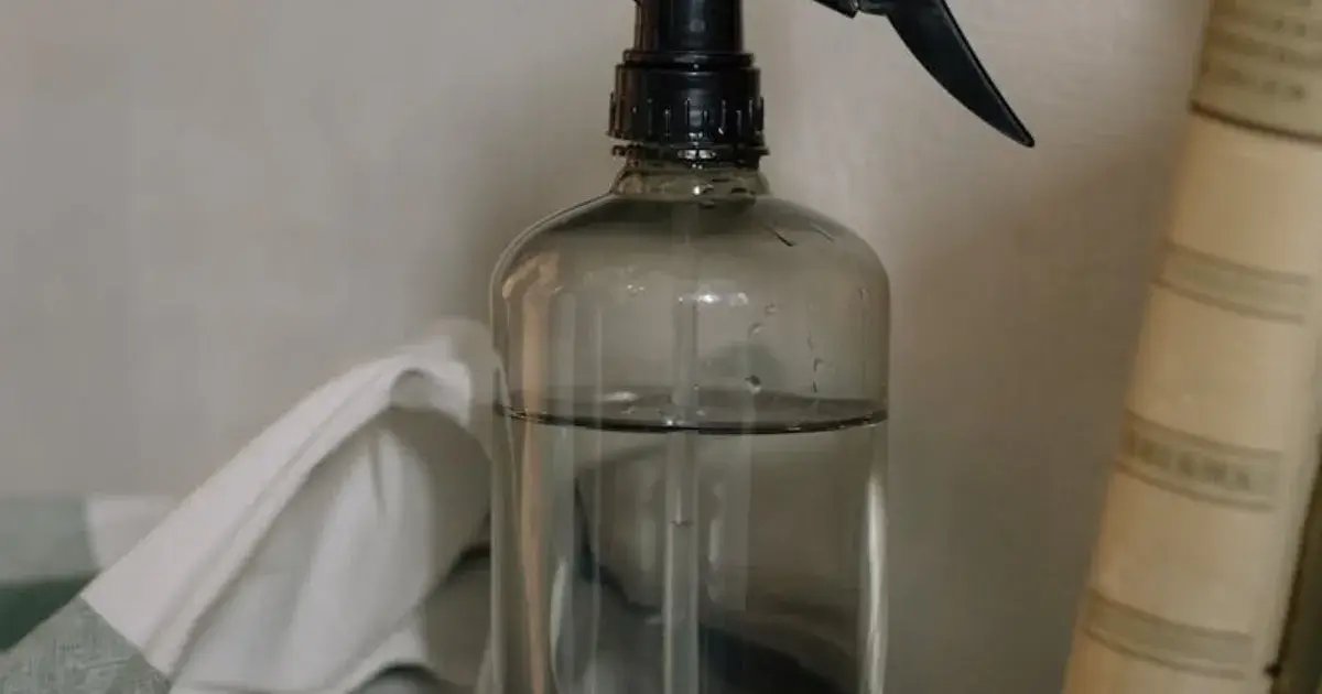 Cleaning a mattress with vinegar — dabbing spots with a light cloth